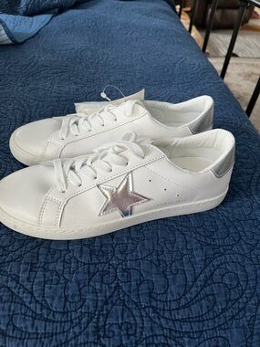 White Sneakers with Silver Star Accent
Vintage Havana
